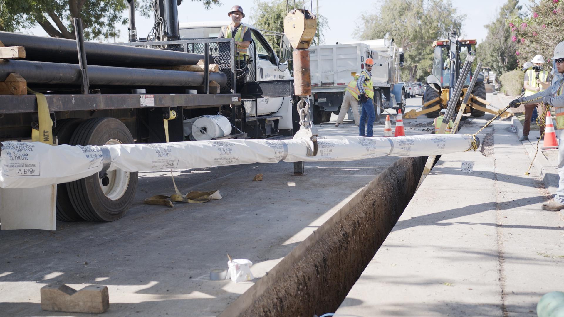 SJW crew replacing pipe